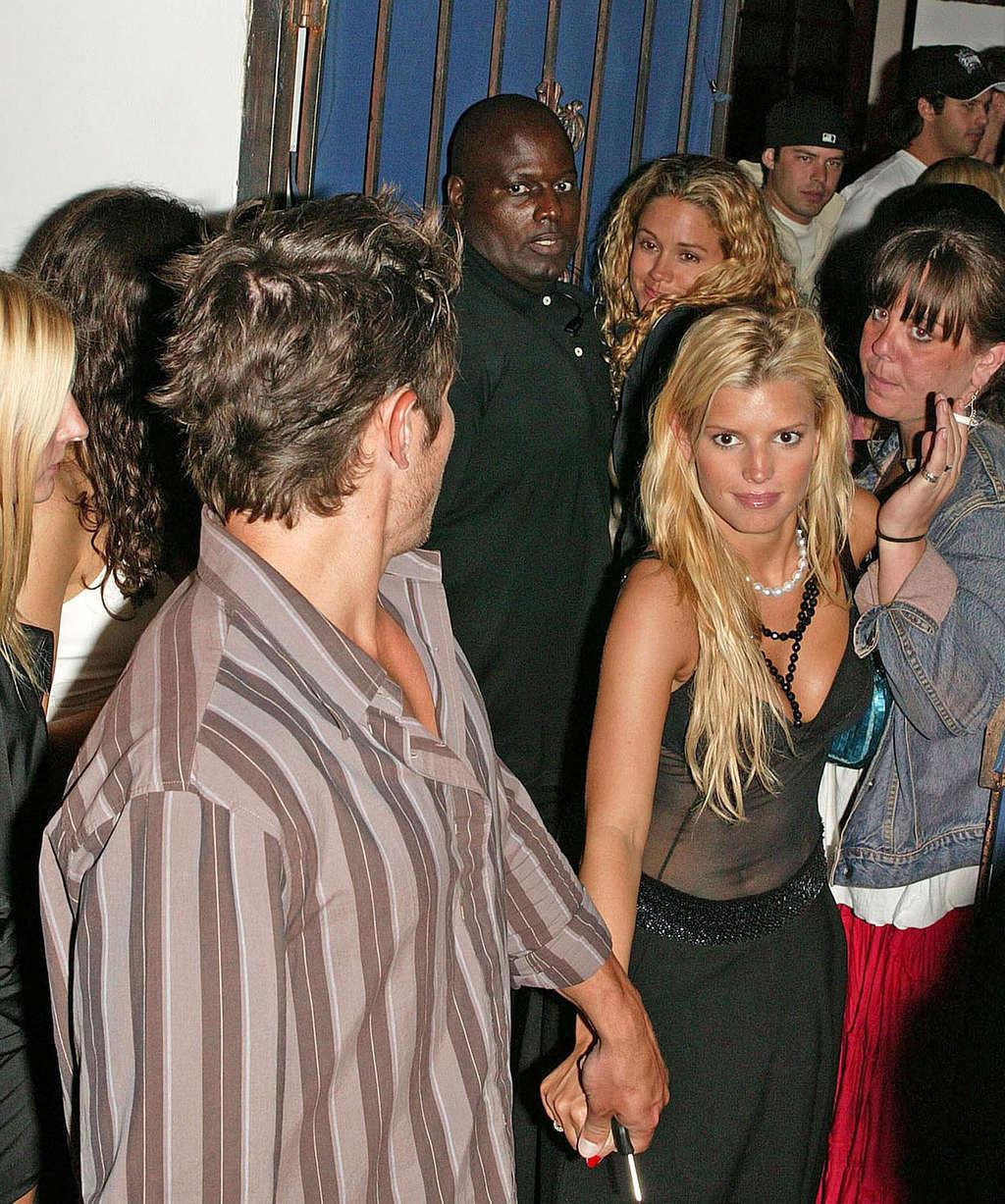 16P Jessica Simpson cleavy in see thru top and upskirt paparazzi pics