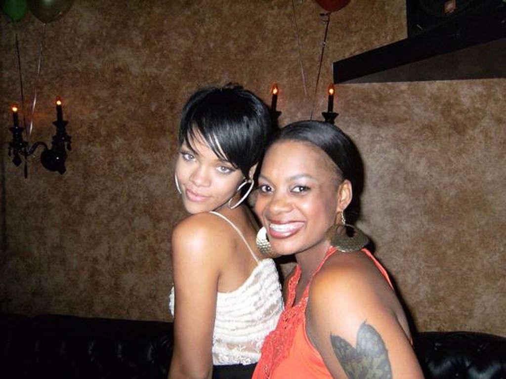 12P Rihanna looking sexy in personal pictures and exposing tits in see thru