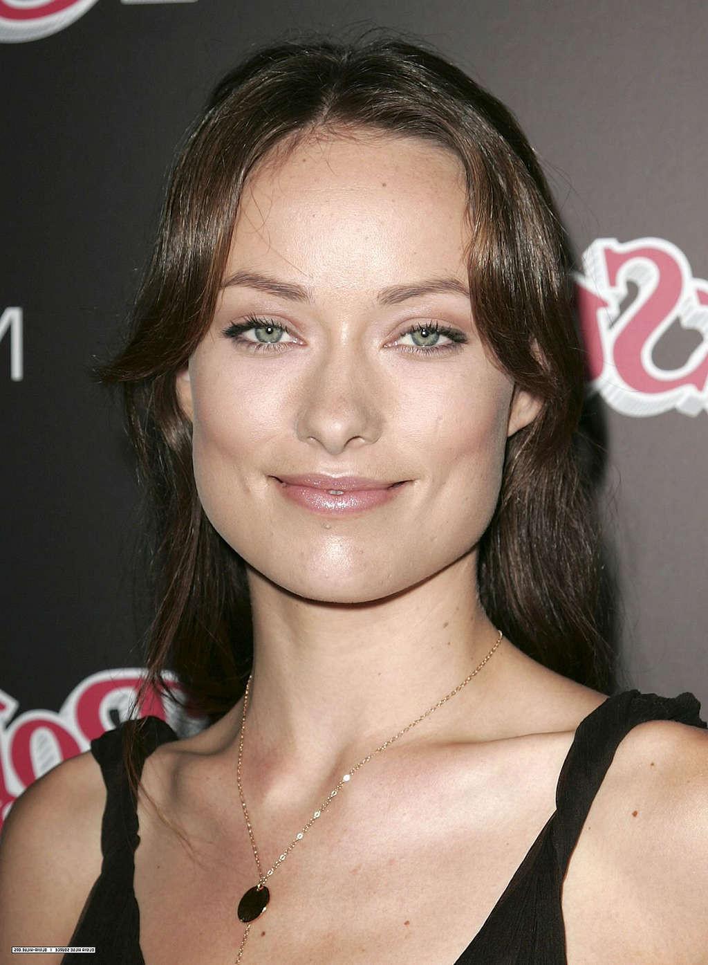 16P Olivia Wilde exposing her nice tits in see thru and posing very sexy