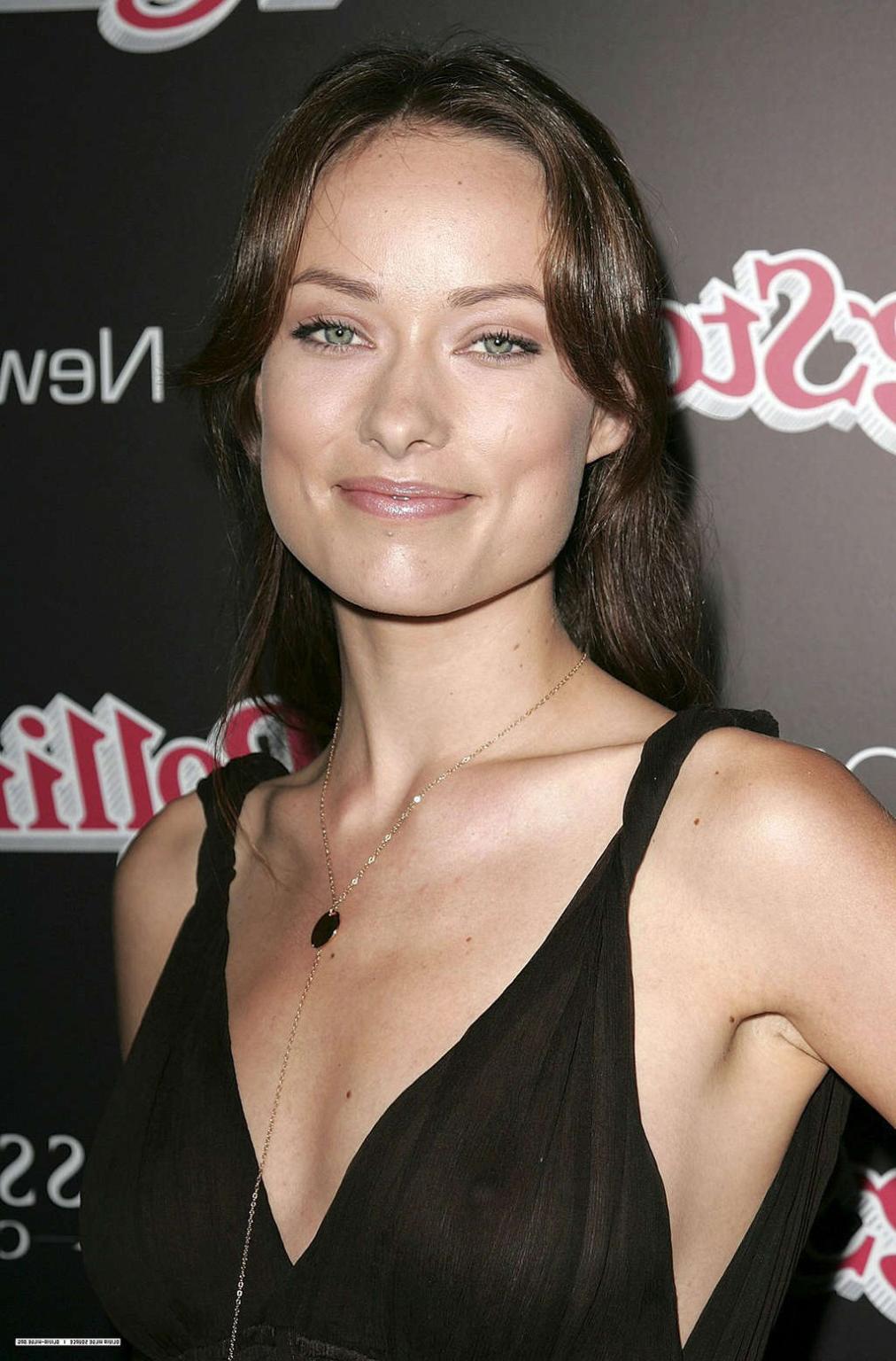 16P Olivia Wilde exposing her nice tits in see thru and posing very sexy