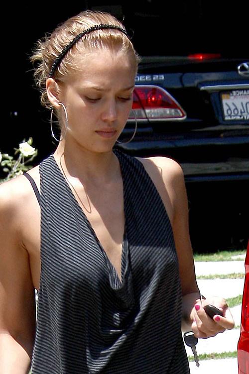 10P Jessica Alba showing her nice tits in wet see thru bikini and posing very sexy
