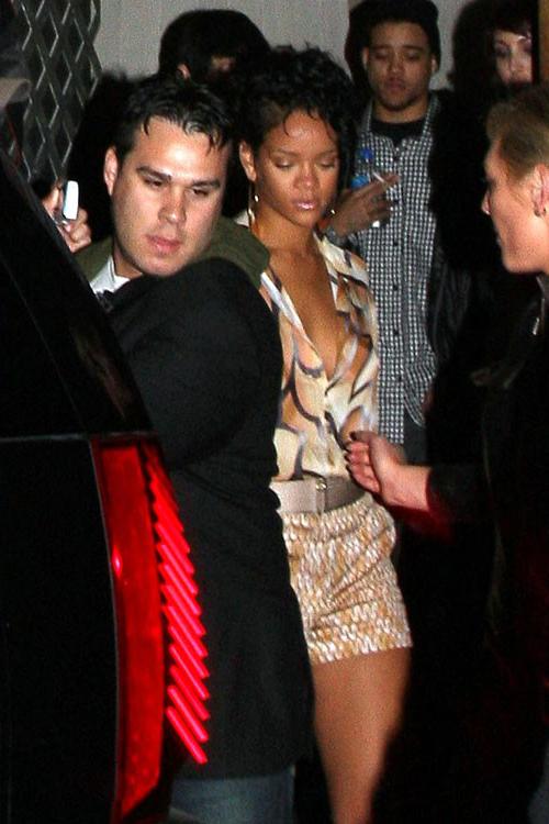 16P Rihanna showing her nice tits in see thru top and great legs in mini skirt