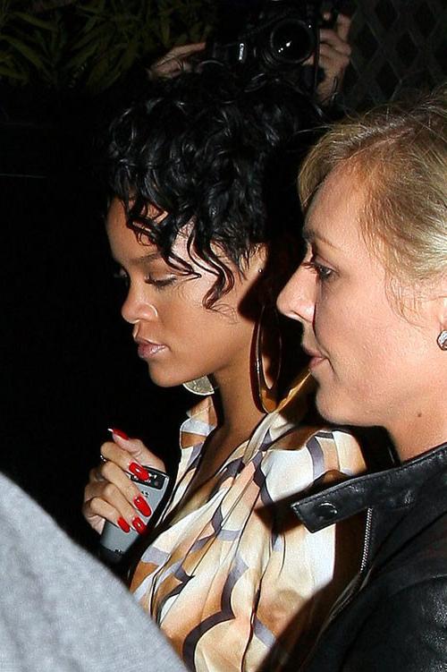 16P Rihanna showing her nice tits in see thru top and great legs in mini skirt