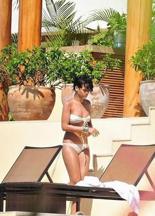 16P Rihanna showing her nice tits in see thru top and great legs in mini skirt