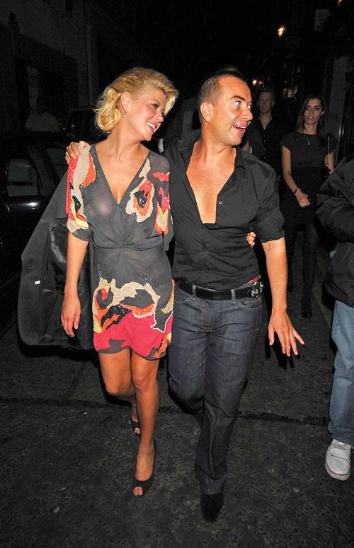 16P Tara Reid showing nice big tits in see thru dress