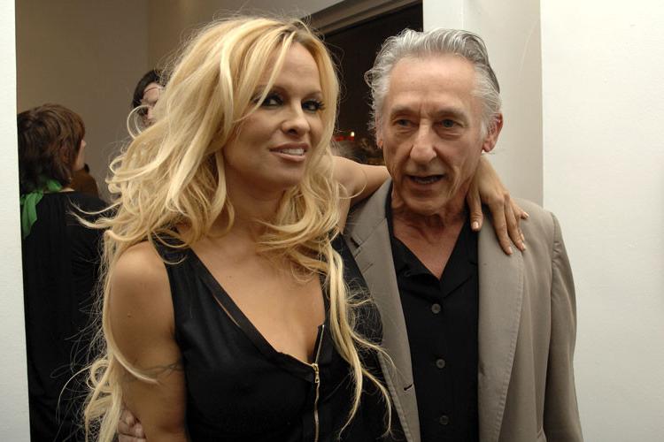 16P Pamela Anderson showing nice big tits in see thru