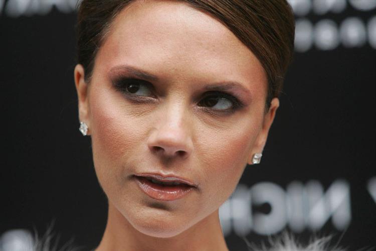 16P Victoria Beckham showing her tits in see thru