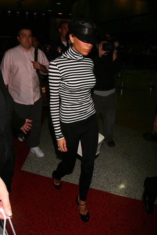 16P Victoria Beckham showing her big tits in see thru and upskirt