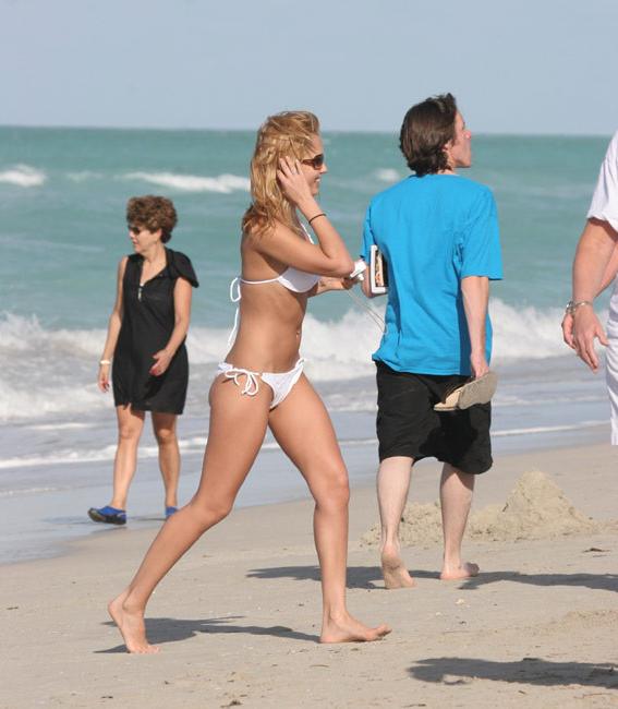 15P Jessica Alba see thru and having fun on the beach