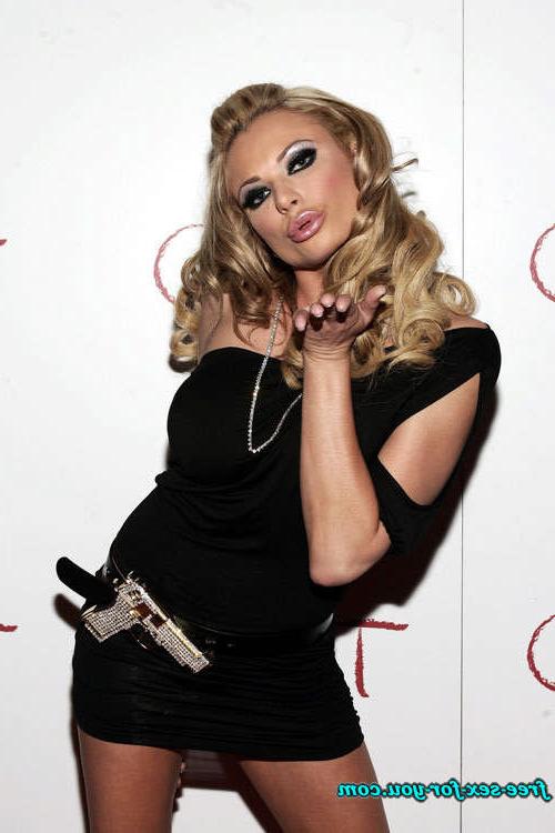16P Briana Banks posing sexy in short see thru mini skirt