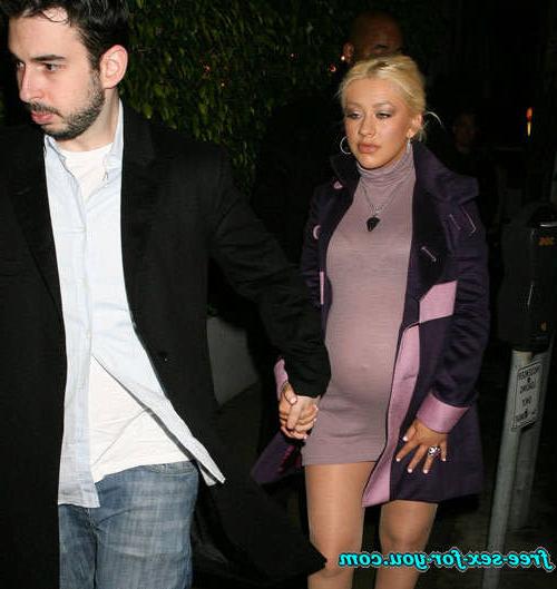 16P Christina Aguilera showing her ass in pool and see thru dress