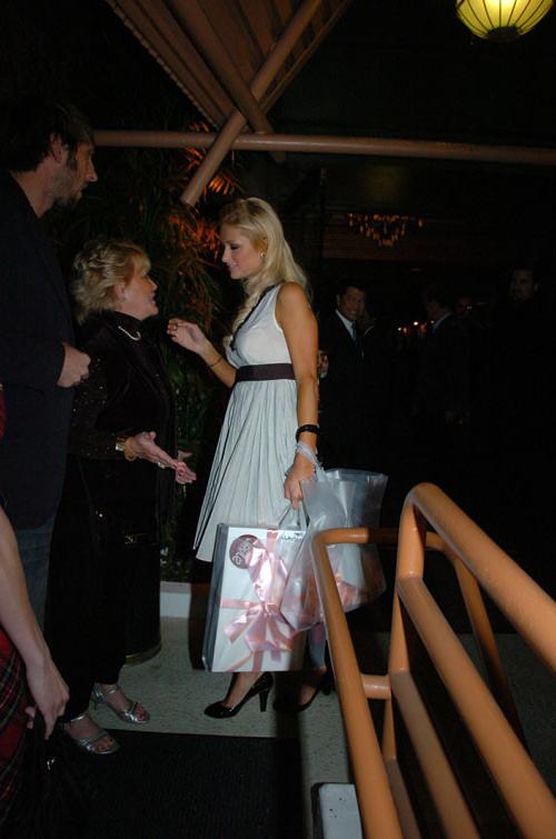 16P Paris Hilton flashing pussy and see thru dress