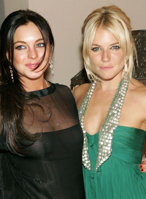 16P Lindsay Lohan upskirt in pantyhose and see thru paparazzi pics