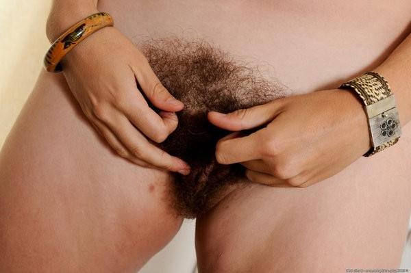 15P Carolina shows off her healthy boobs and hairy pussy