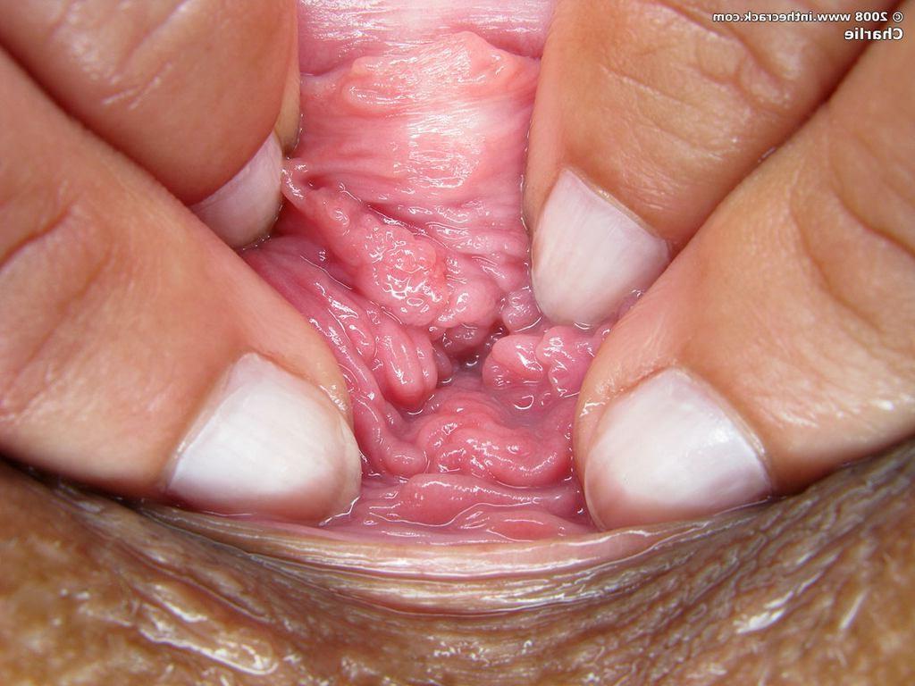 15P Babe spreads pink pussy wide open for spiked dildo