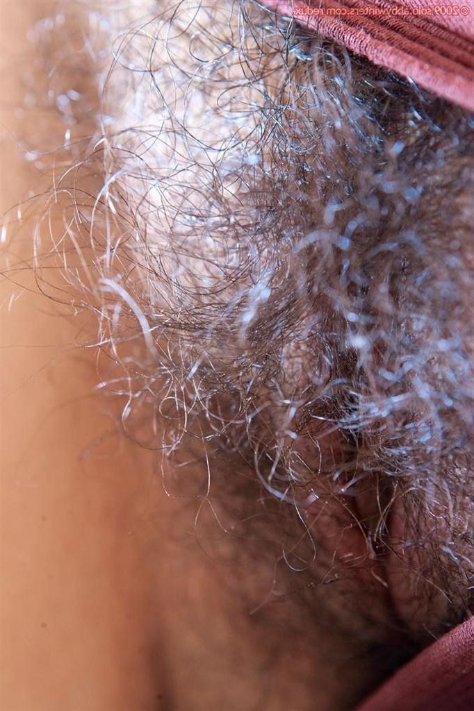 16P Amateur teen stripping and spreading her very hairy pussy