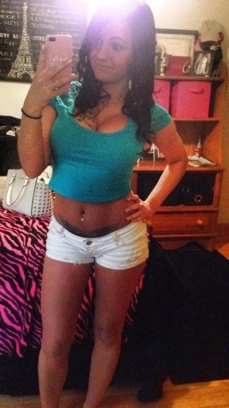 15P Heavy-chested inked chick displays her juggs and sexy ass