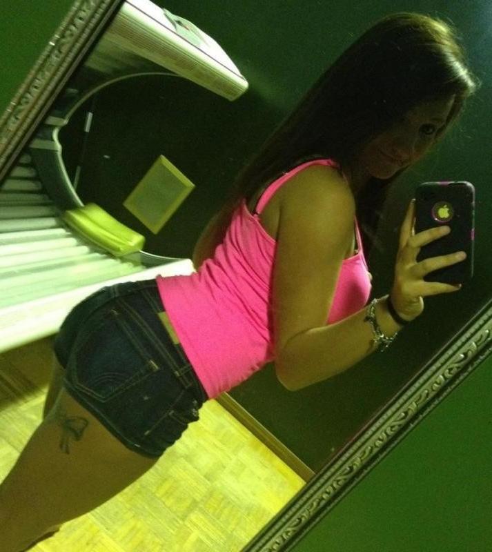 15P Heavy-chested inked chick displays her juggs and sexy ass