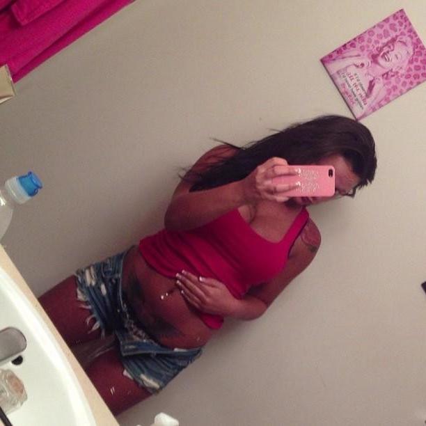15P Heavy-chested inked chick displays her juggs and sexy ass