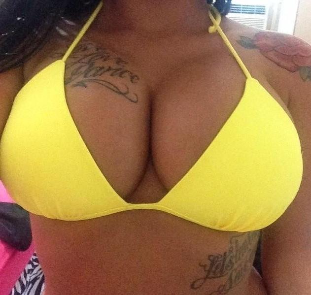 15P Heavy-chested inked chick displays her juggs and sexy ass