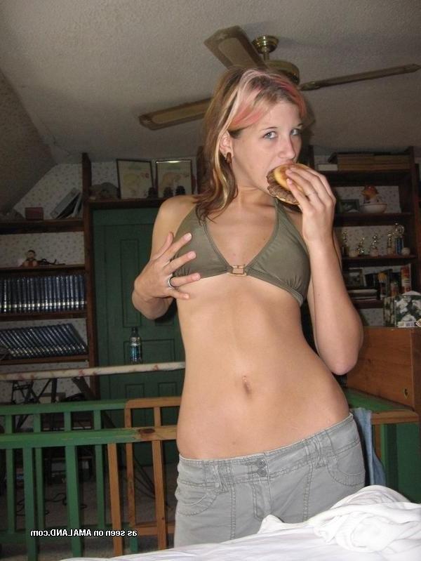 9P Sexy blue-eyed emo chick flashing her breasts