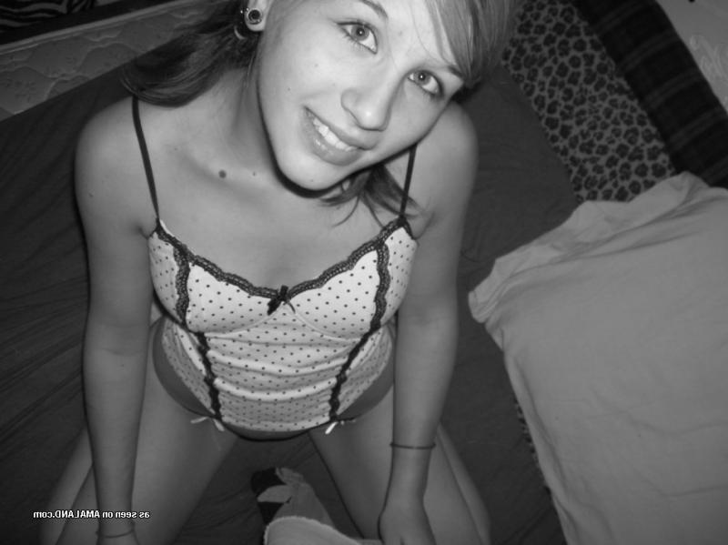 9P Sexy blue-eyed emo chick flashing her breasts