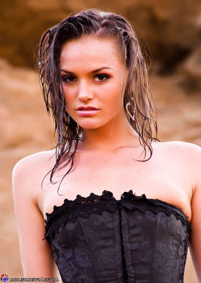 15P Tori Black outside and wet in a Corset and Stockings
