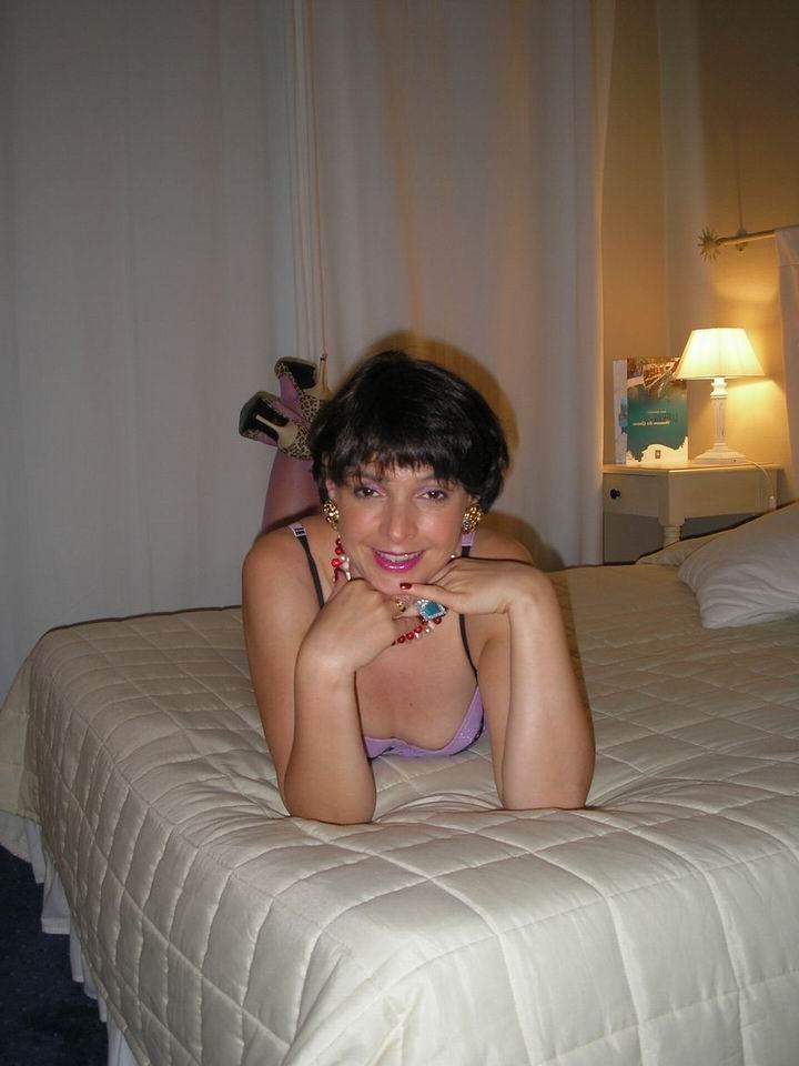 15P Amateur housewife Nathalie posing in lingerie