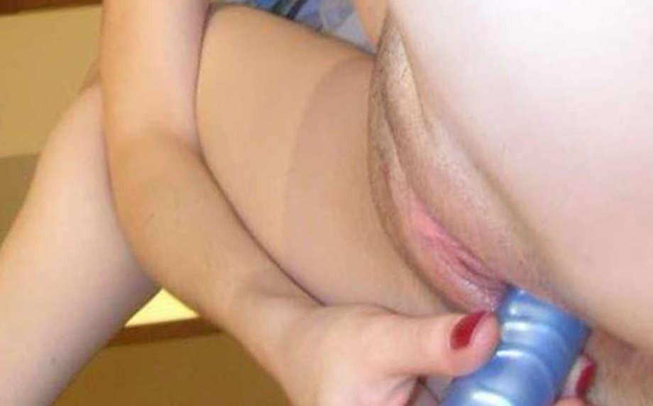 16P Picture compilation of a chick poking her cunt  with a blue dildo