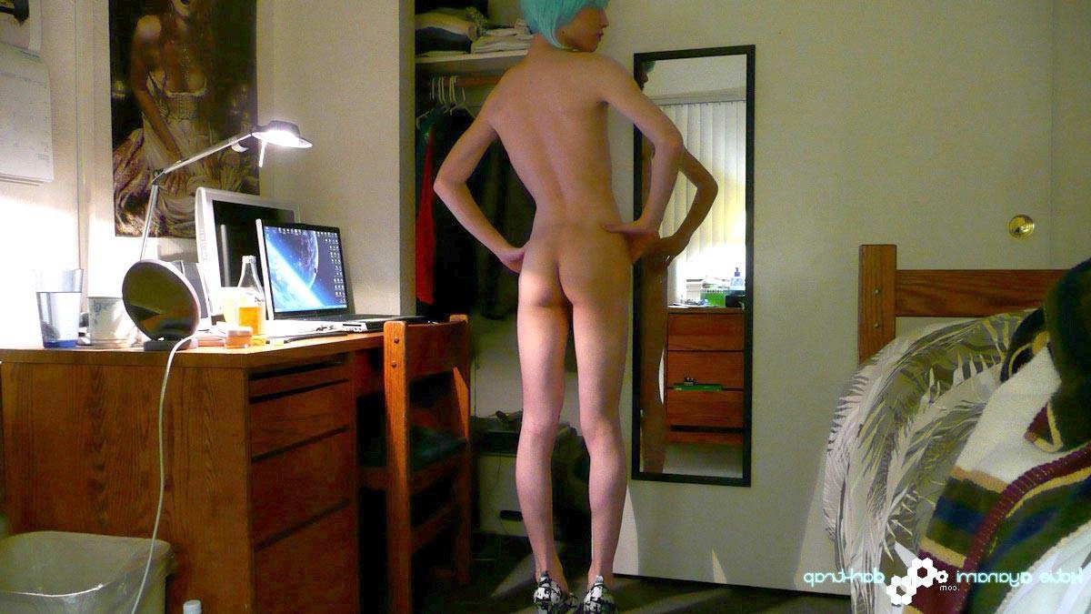 16P Young japanese newhalf in blue wig posing