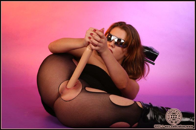 17P Flexible brunette stuffing her ass and pussy with a thick dildo