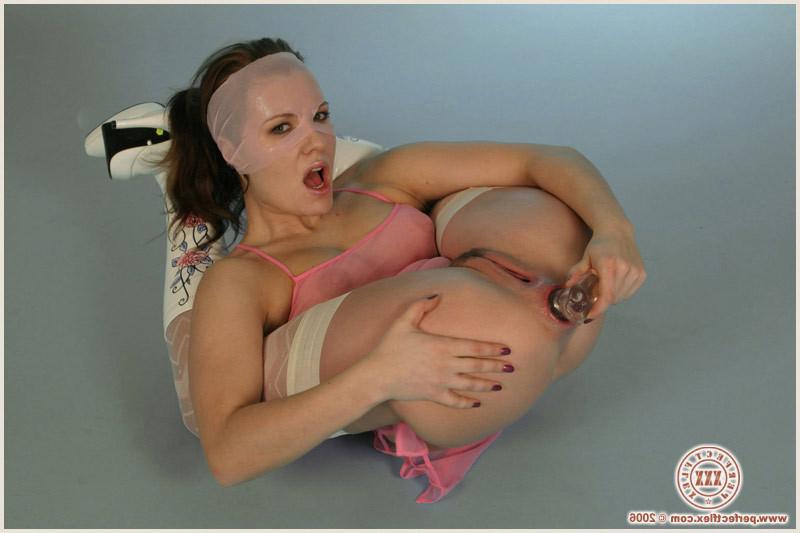 17P Flexible chick stuffing all her holes with a thick glass dildo