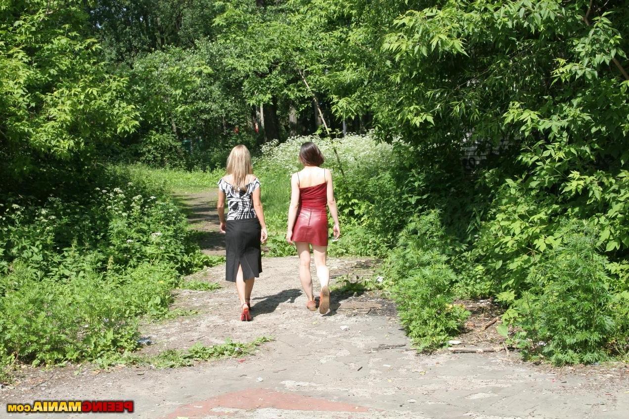 15P Two smut chicks lift up their skirts and void thru the lovely panties