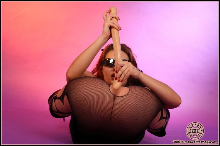 16P Hot flexible brunette stuffing her ass and pussy with a dildo