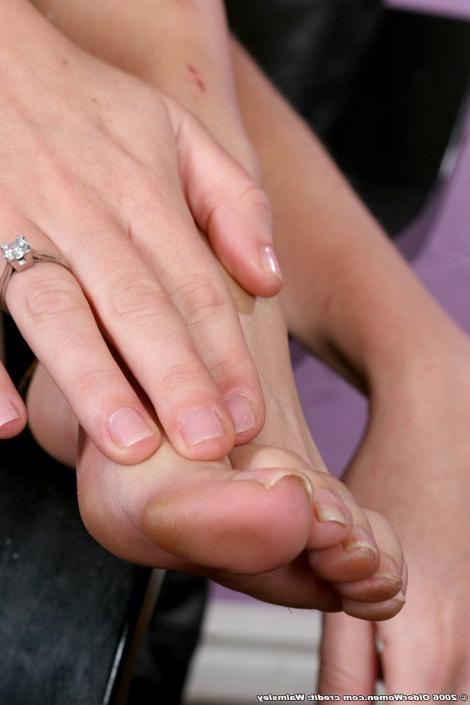 16P Leggy Fortyish Blonde Fondling Her Bare Feet and Toes