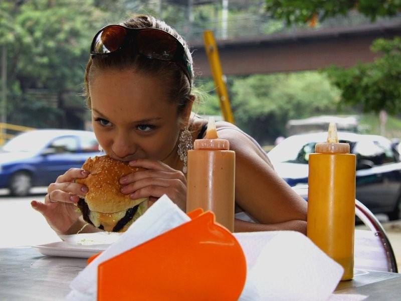 16P Busty teen Paris Milan eating a burger with fries