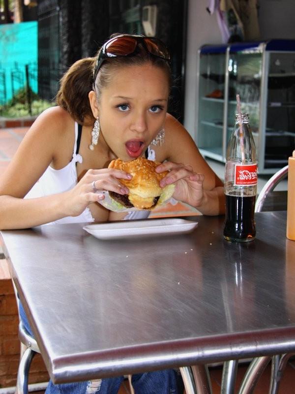 16P Busty teen Paris Milan eating a burger with fries