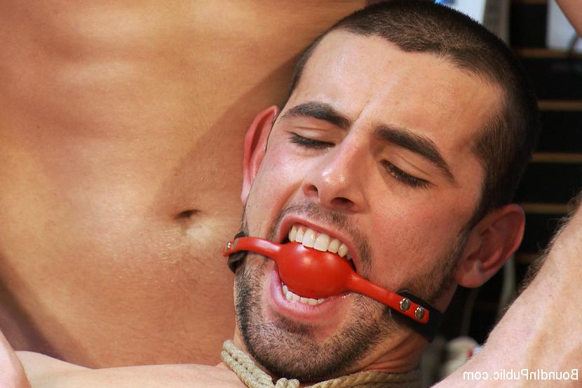 15P Tristan Jaxx stuffs his fat cock into Jake Steel's ass through the glory hole as