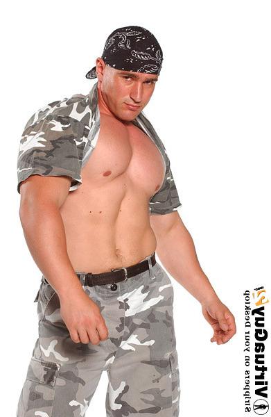 16P Muscular guy in military outfit posing