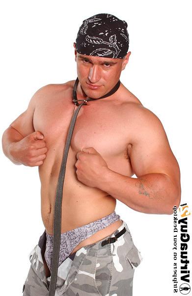 16P Muscular guy in military outfit posing