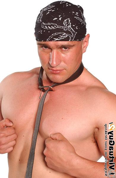 16P Muscular guy in military outfit posing