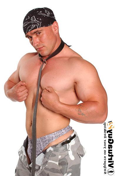16P Muscular guy in military outfit posing