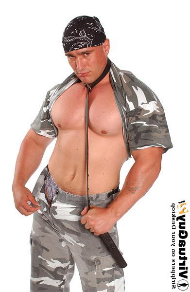 16P Muscular guy in military outfit posing