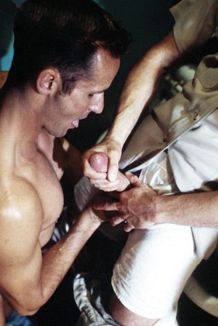 20P Curious cop getting sucked by two muscle dudes in a toilet