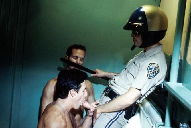 20P Curious cop getting sucked by two muscle dudes in a toilet