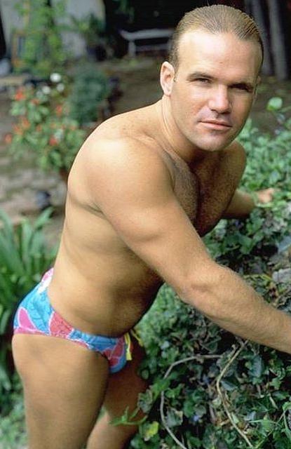 20P A hairy chested outdoor knight showing in and out of speedos