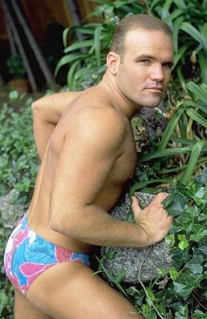 20P A hairy chested outdoor knight showing in and out of speedos