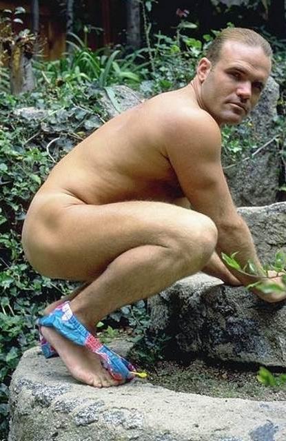 20P A hairy chested outdoor knight showing in and out of speedos