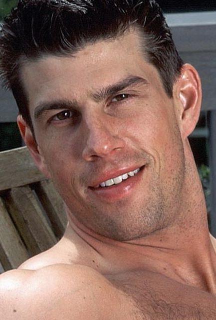 20P A hairy muscle hunk enjoyd outdoor stripping and showing off