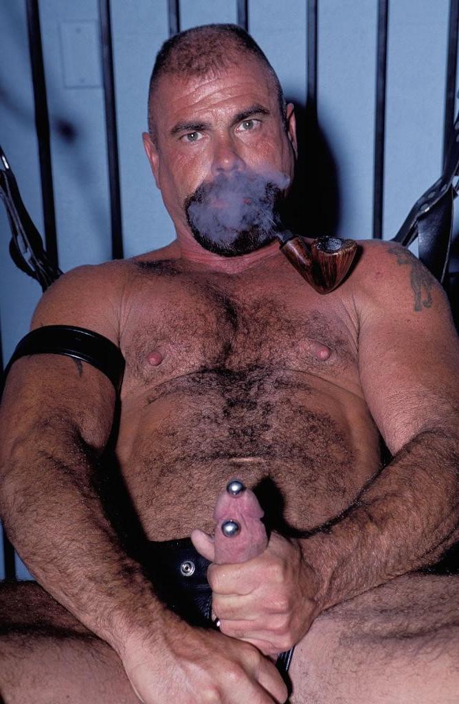 20P Gay bear loves playing his pierced huge cock in leather